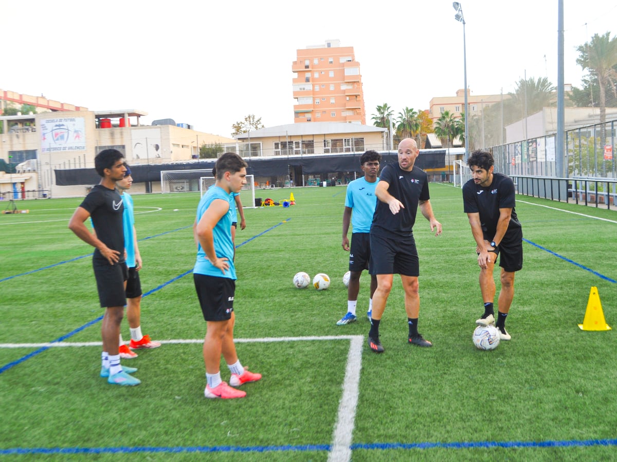 Coach briefing players on tactics