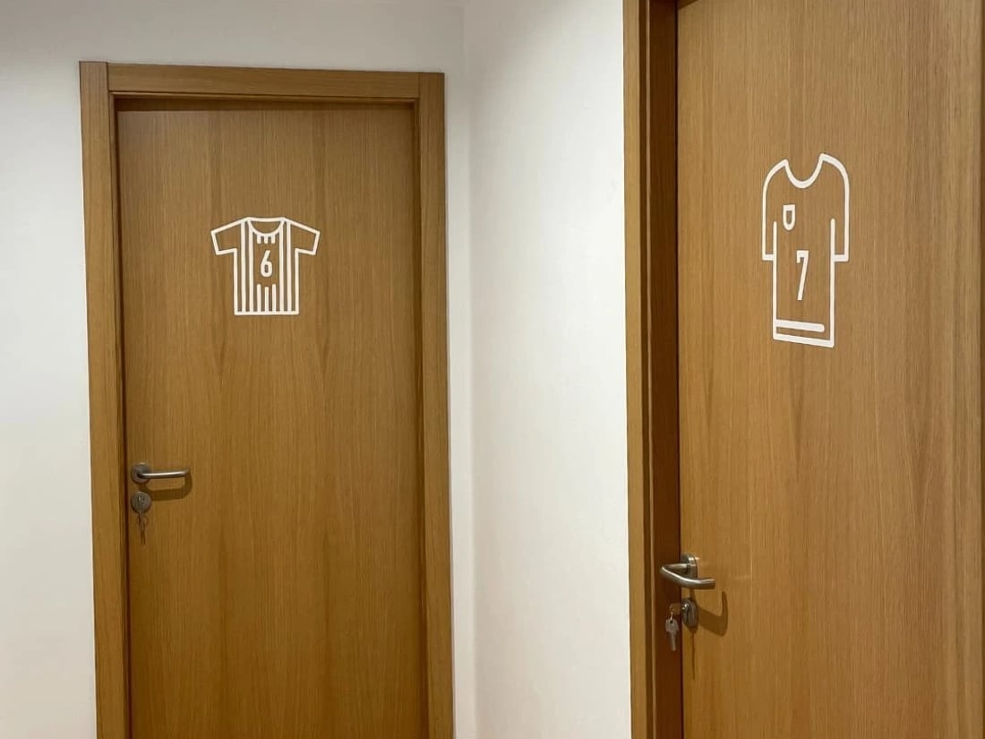 Bedroom doors with football jersey graphics