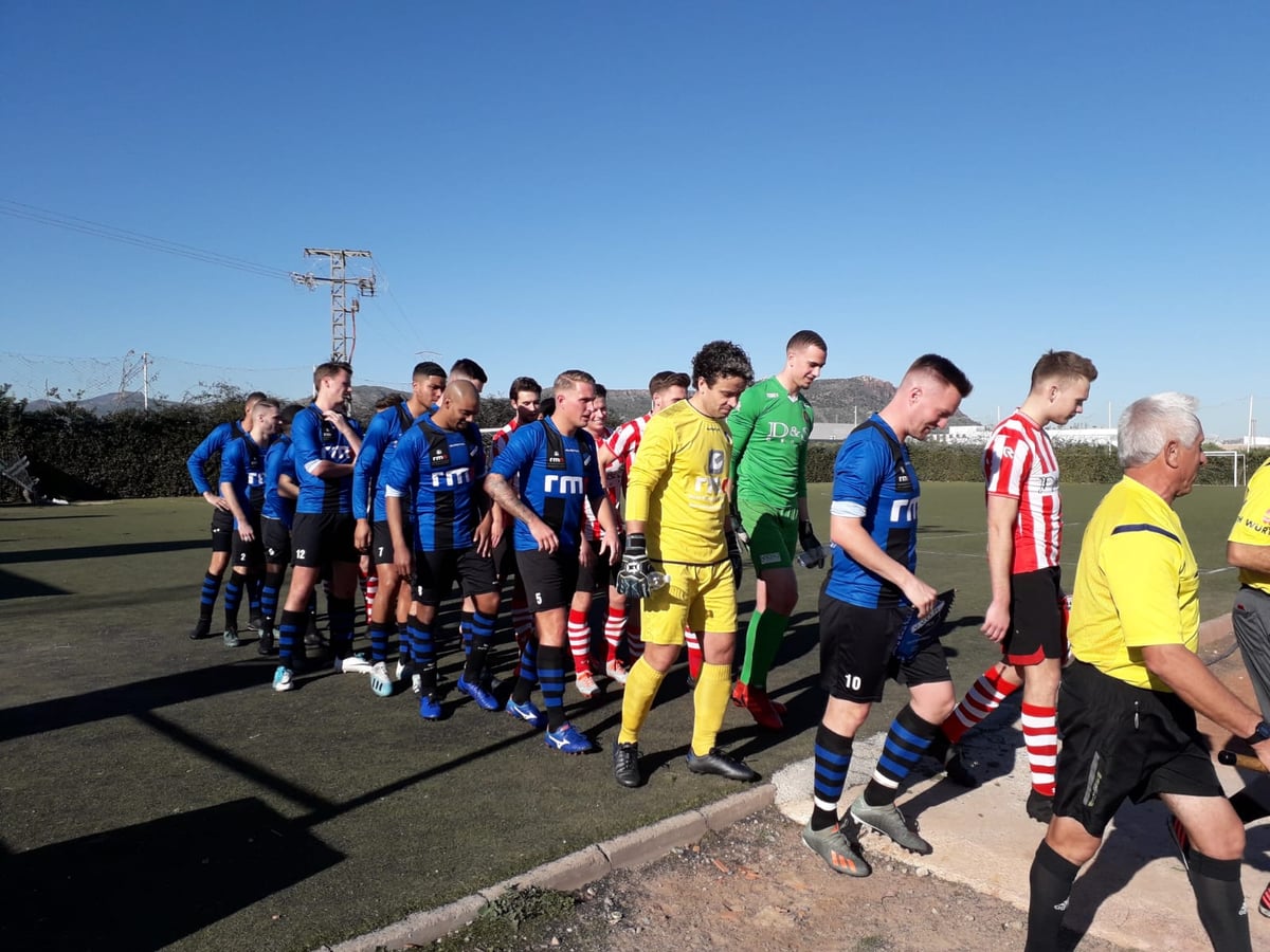 Teams walking out for a competitive fixture