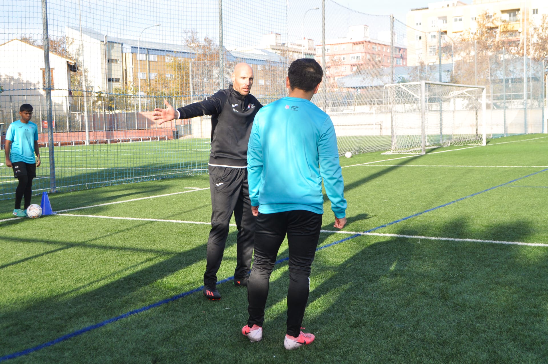 Coach evaluating player performance